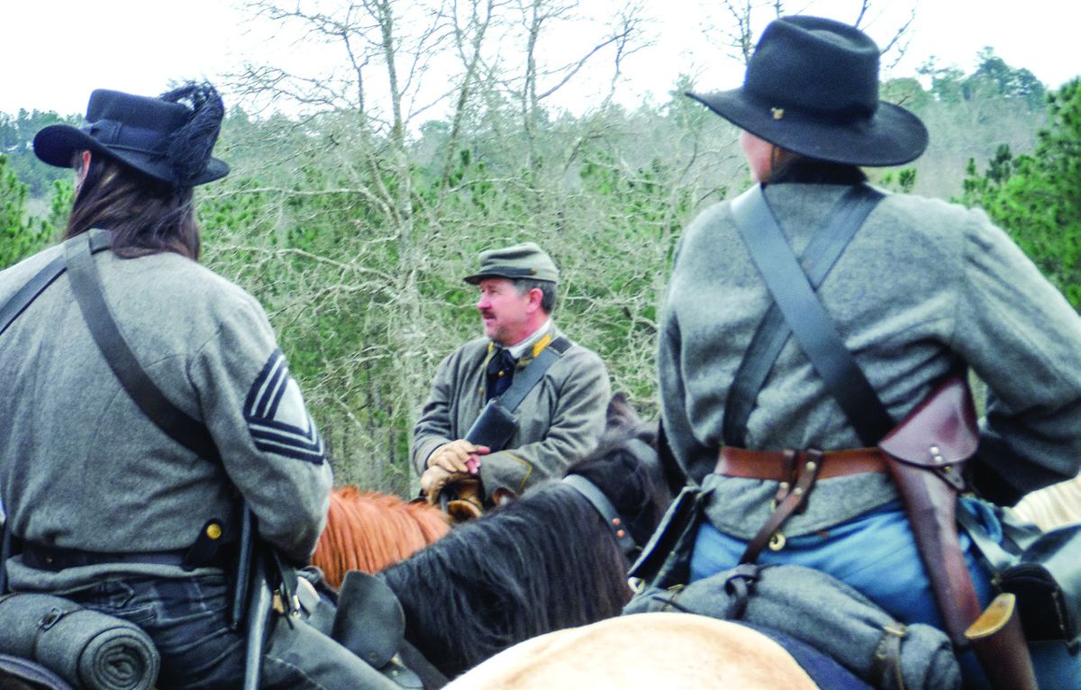 Captain Jeff Reno with the 5th Georgia Volunteer Cavalry confers with Confederate troopers before the fighting began.