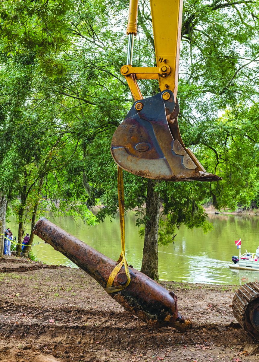 U.S. 9-inch Dahlgren shell gun being transported to the preparation area. Glenn Dutton of Long Bay Salvage operated the excavator during the removal process.