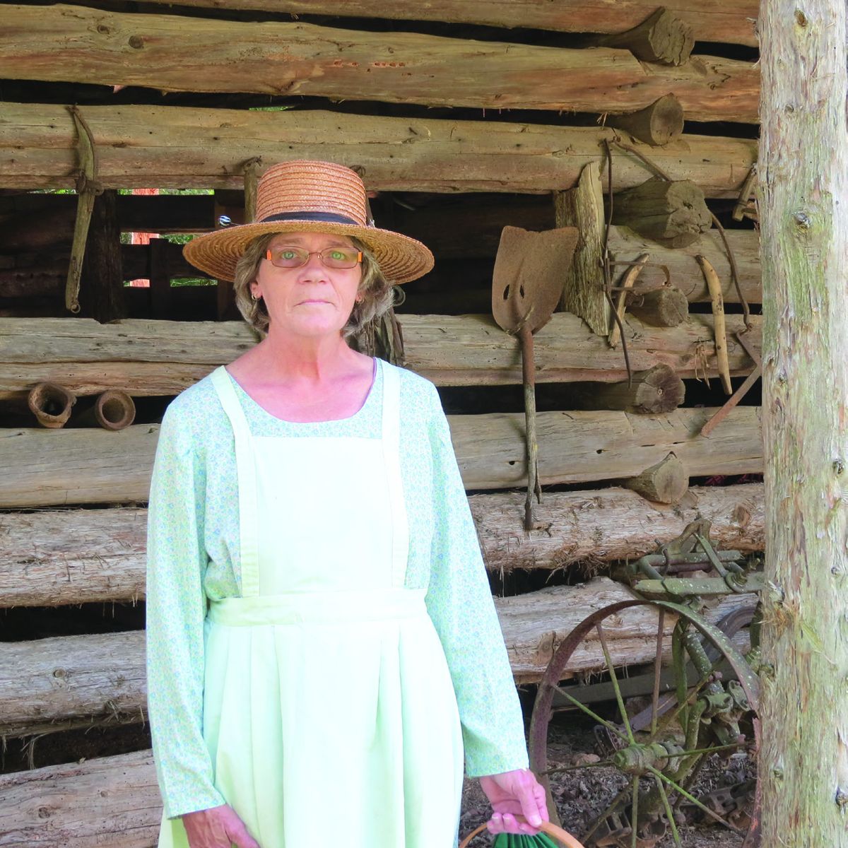 Connie Kelley in front of the restored Forrest barn.