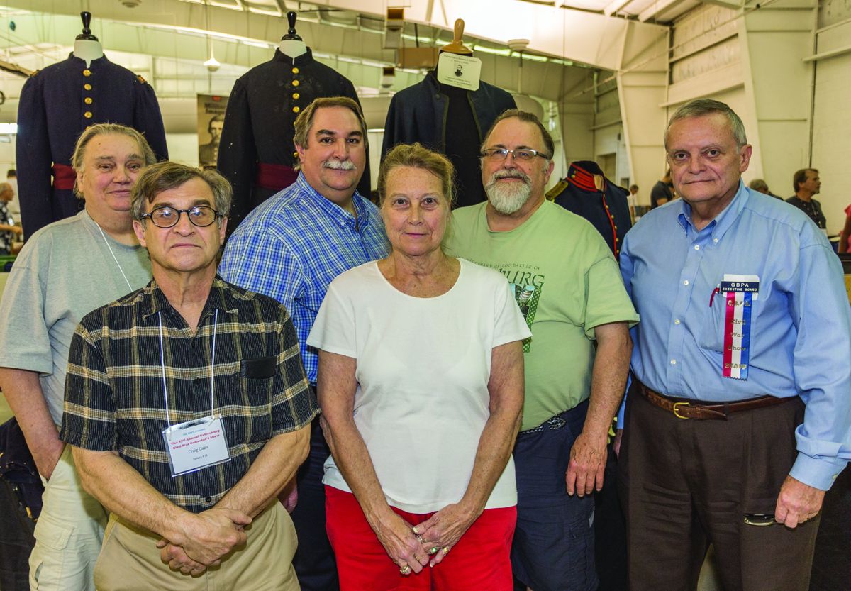 Several members of the GBPA Board of Directors spent their Saturday assisting working at the Artifact and Collectibles Show. Left to right: Bill Synnamon, Craig Caba, Mark Zagursky, President Barb Mowery, Jay Purdy and Vice-President Stephen Reed. Caba is the last remaining charter member of the GBPA, which was formed in 1959.