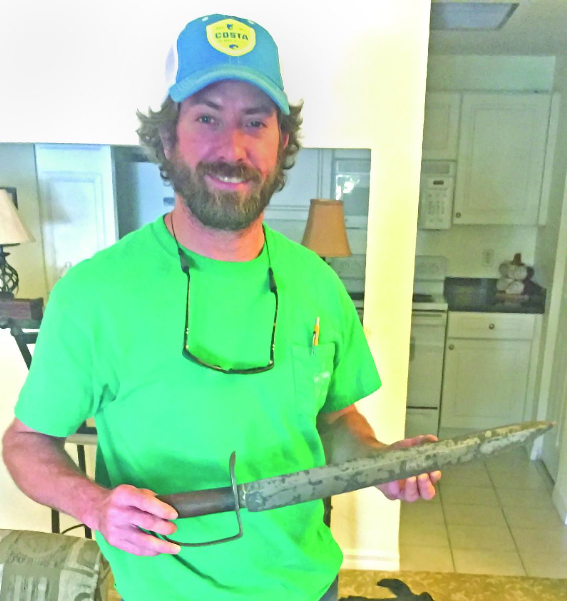 Justin Beachum holding the D-guard made for Captain Boggan.