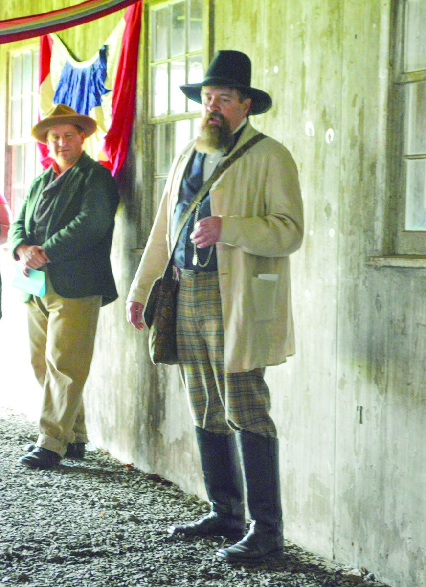 Tom Craig, of Torrington, Conn., looks on with interest as Brian Ross of Berlin, N.J., gives a political speech detailing the results of the 1860
