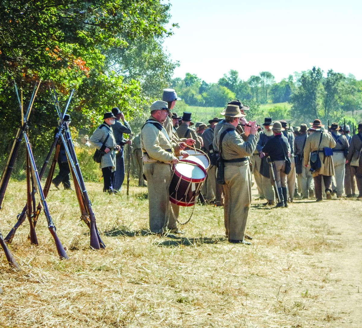 Drum and fife band playing patriotic music to the marching troops.