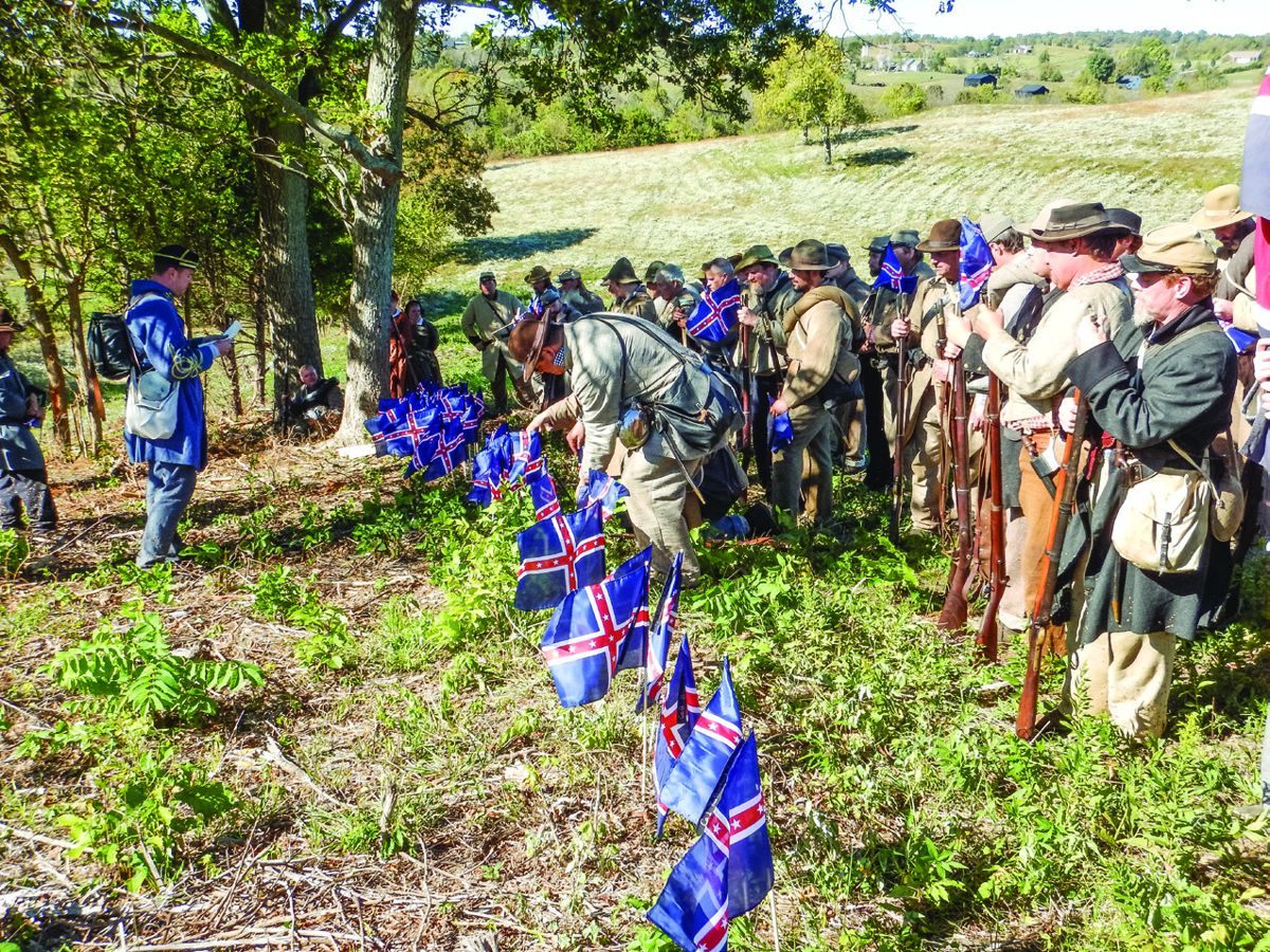 Flag planting memorial for the Tennessee dead.