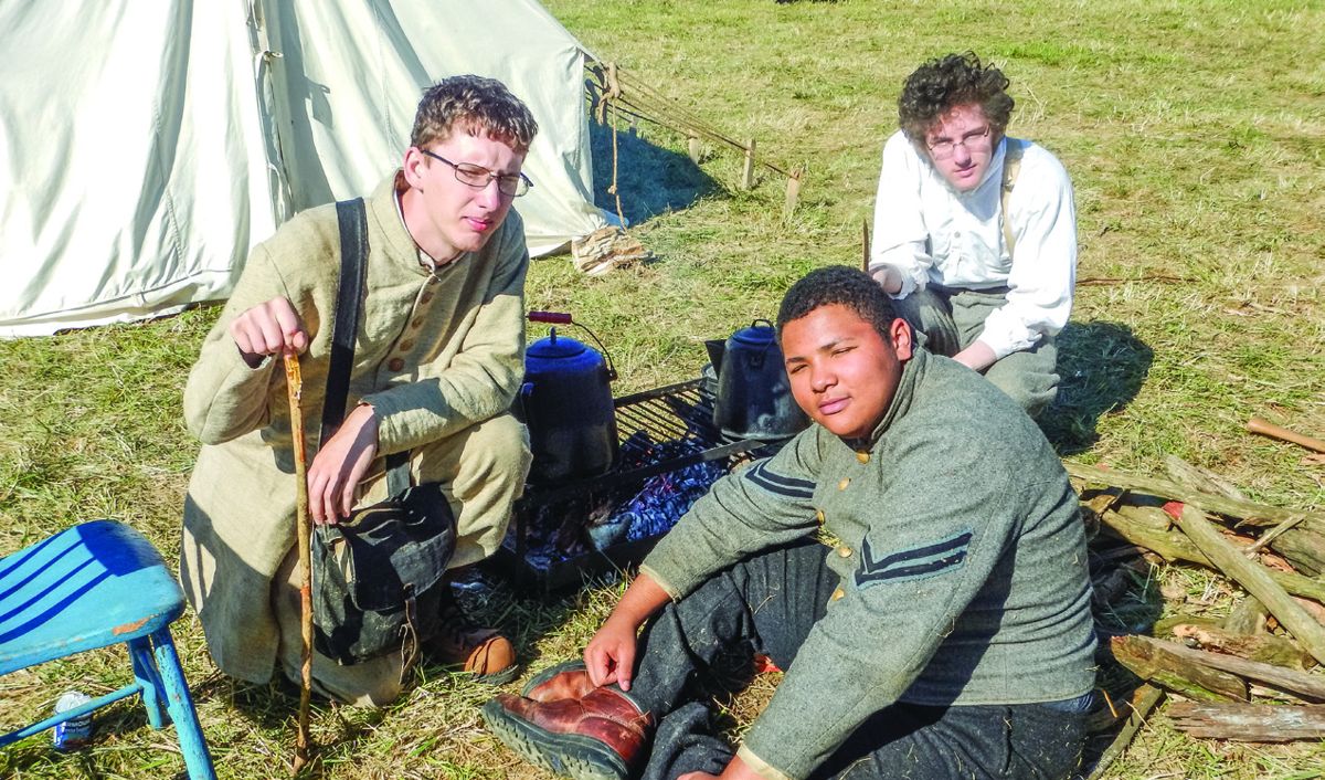 Tryston Smith of Galion, Ohio (Sitting), Jonah Fairfield in white shirt and Ryan Fairfield of Oberlin, Ohio 5th Texas Company A.