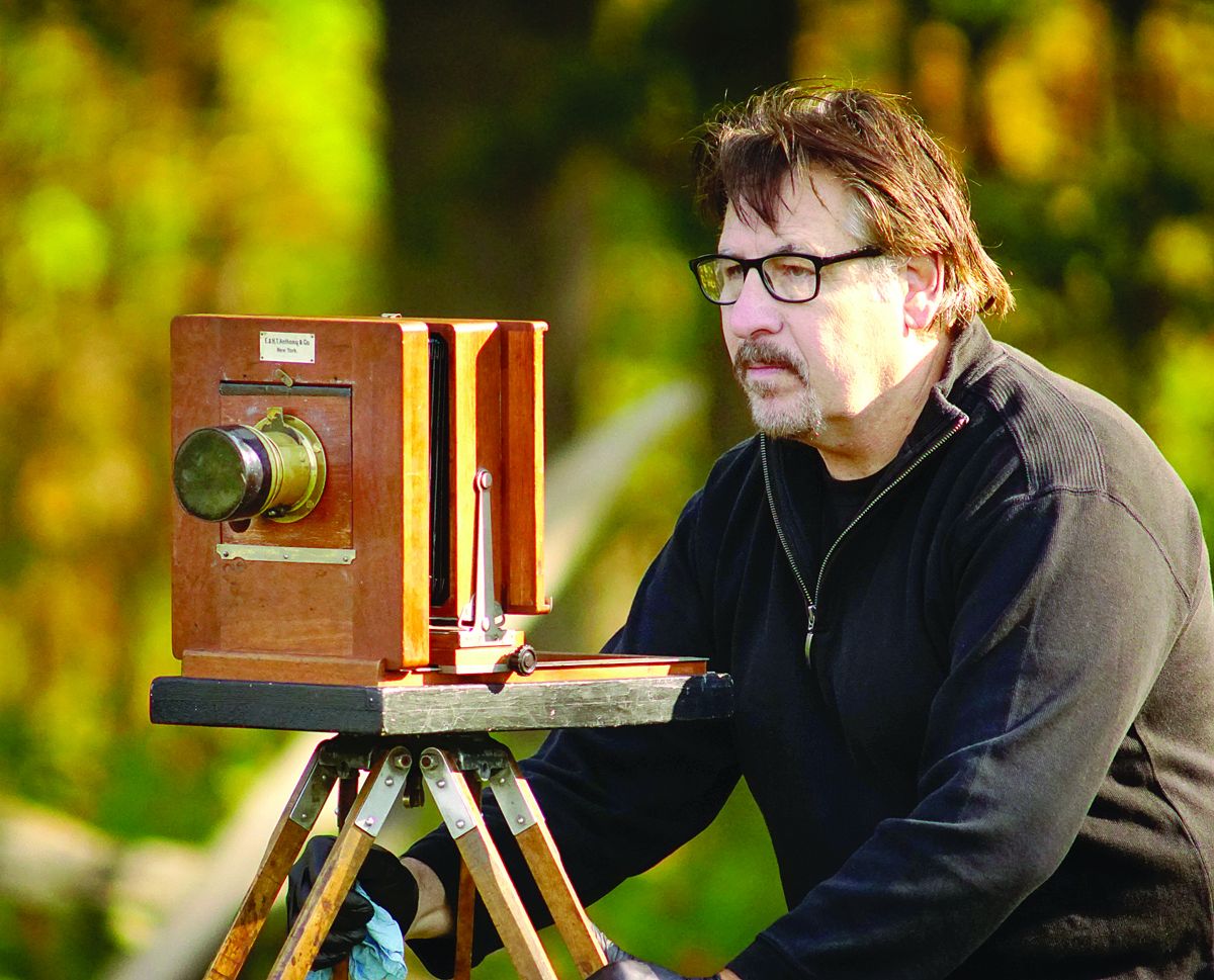 Gettysburg wet plate photographer Rob Gibson describes the process for taking battlefield photographs during the Civil War during the Image of War seminar’s visit to the Rose Farm. (Shenandoah Sanchez)