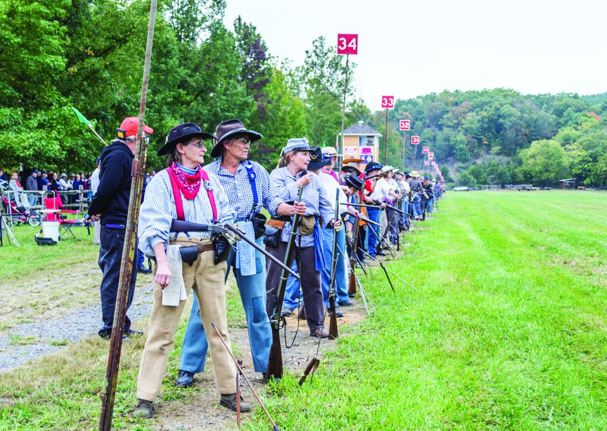 Shooters get ready to fire in the first relay of the 25th Anniversary Women in Skirmishing event that was held on Friday evening. The first women skirmishers joined the N-SSA in 1991. (Ericka Hoffmann)