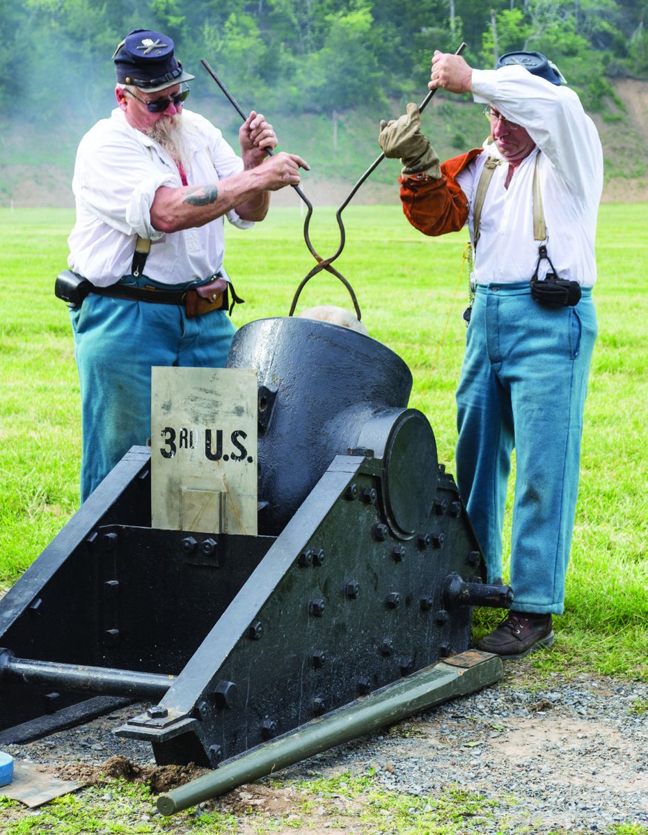 The mortar match is very competitive with 67 entrants at this national. None was as large as this original 10-inch Fort Pitt siege mortar, reputedly used in the siege of Petersburg. The artillery crew are loading a 97 pound solid zinc cannonball safely into the bore.