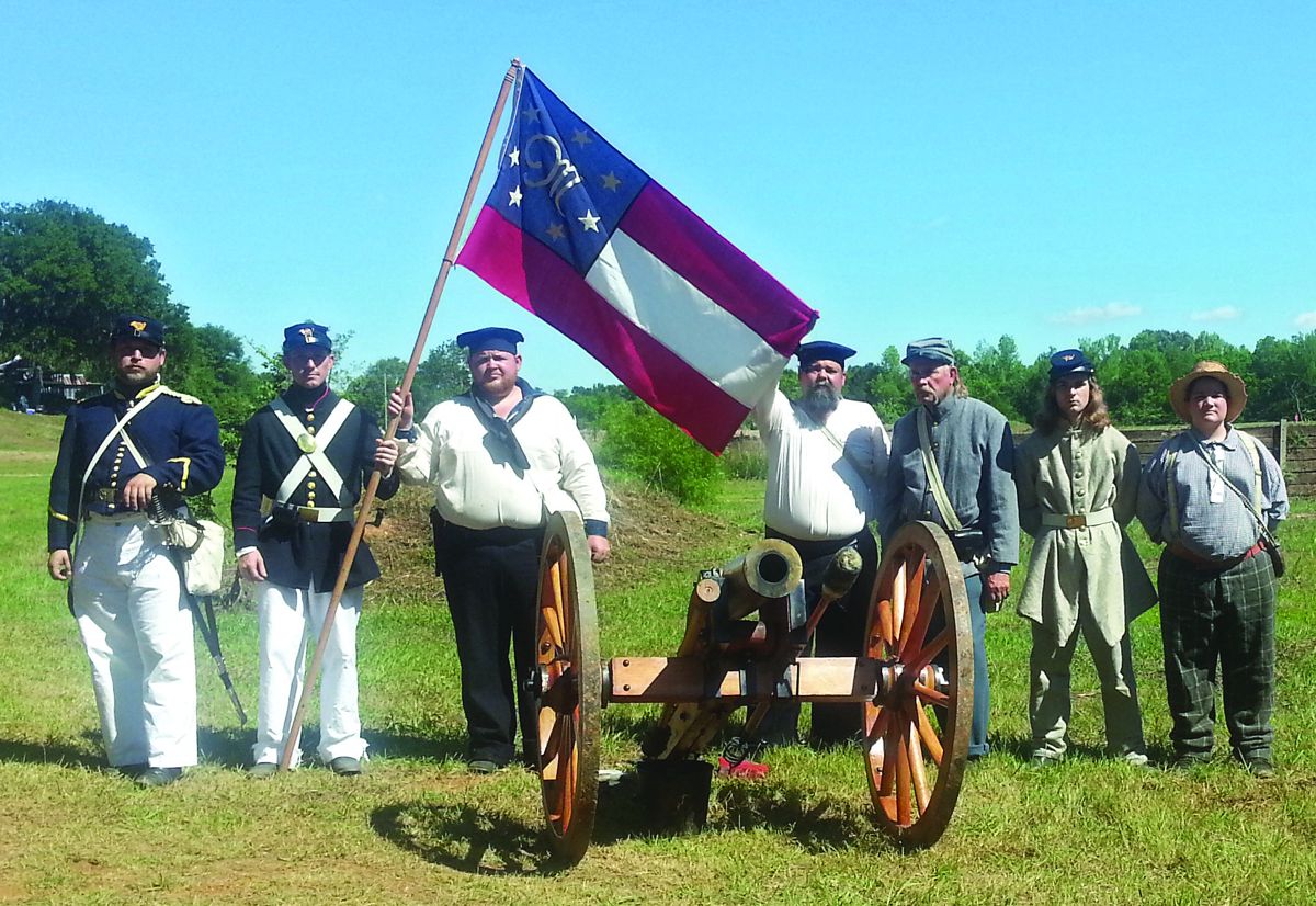 Pictured here is the crew of a Mountain Howitzer belonging to Michael Redman. (L-R) Marine Detachment Commander Captain Michael Redman, Jesse Oglesby, Jonathan Bolin, Jeffrey Hall, Mack Lott, Morgan Oglesby and a walk up volunteer powder monkey. (Photos William Lockridge)