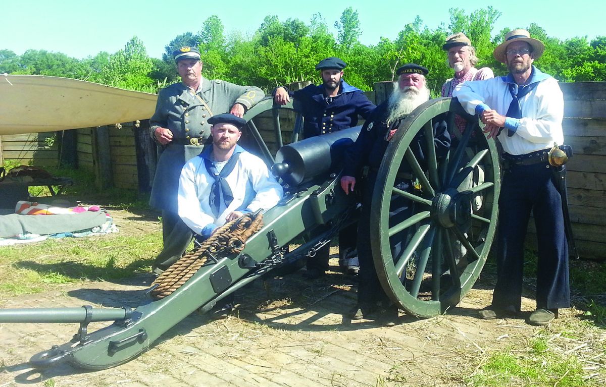 Pictured here is the crew of a Mountain Howitzer belonging to Michael Redman. (L-R) Marine Detachment Commander Captain Michael Redman, Jesse Oglesby, Jonathan Bolin, Jeffrey Hall, Mack Lott, Morgan Oglesby and a walk up volunteer powder monkey. (Photos William Lockridge)