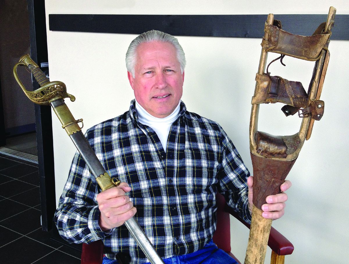 Historian Lance Ingmire with a 95th Regiment presentation sword and William Maxwell’s wooden leg.
