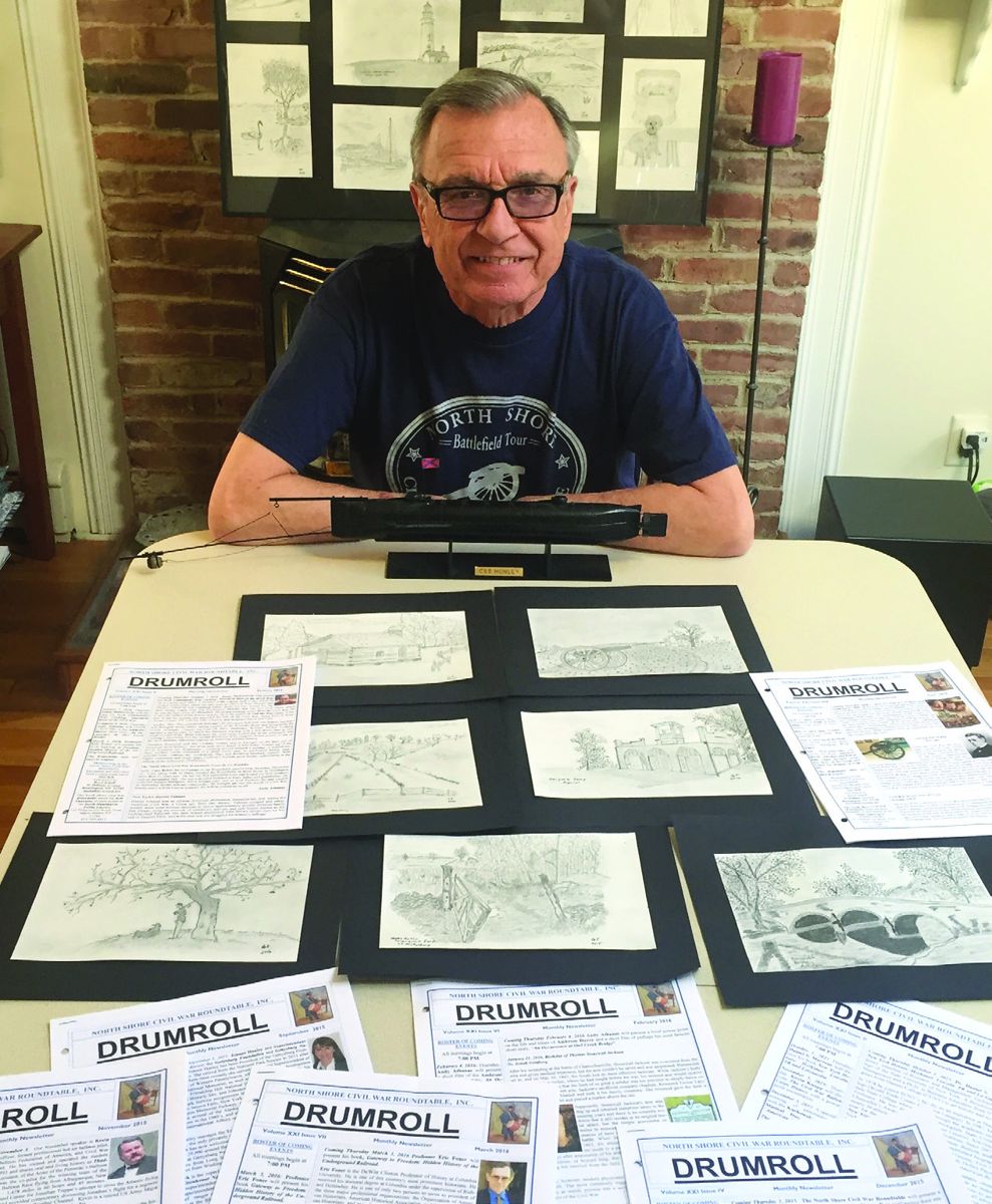 Andrew Athanas sitting behind some of his many contributions to the Long Island’s North Shore Civil War Round Table. (Sam Athanas)