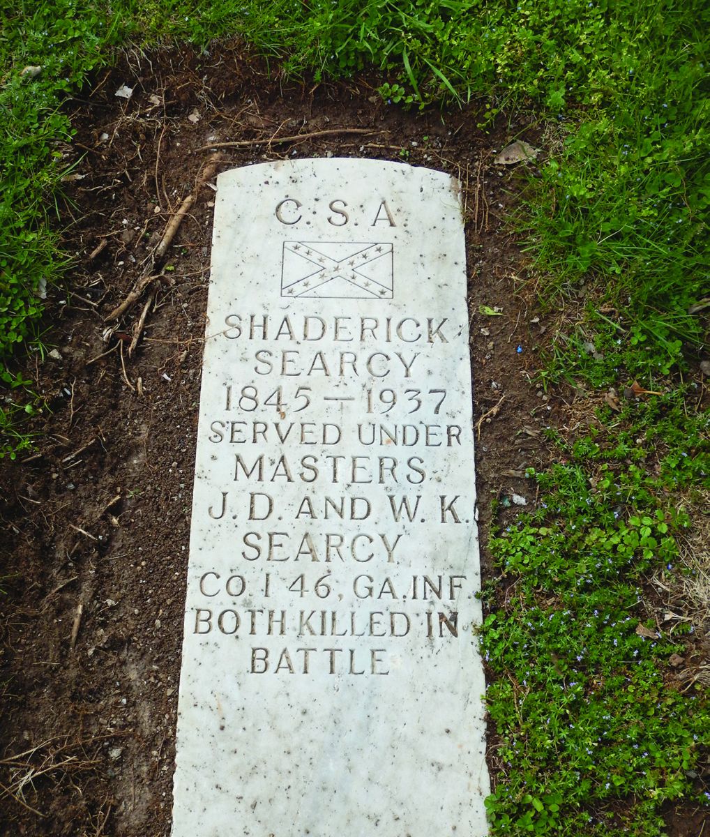 Headstone of Shaderick Searcy, a Confederate solider killed in battle along with his masters.