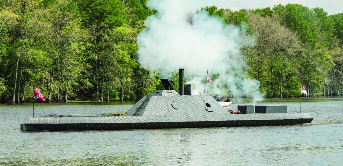Smoke billows from the gunport and thunder echoes across the Roanoke River when the replica of the CSS Albemarle fires its guns.