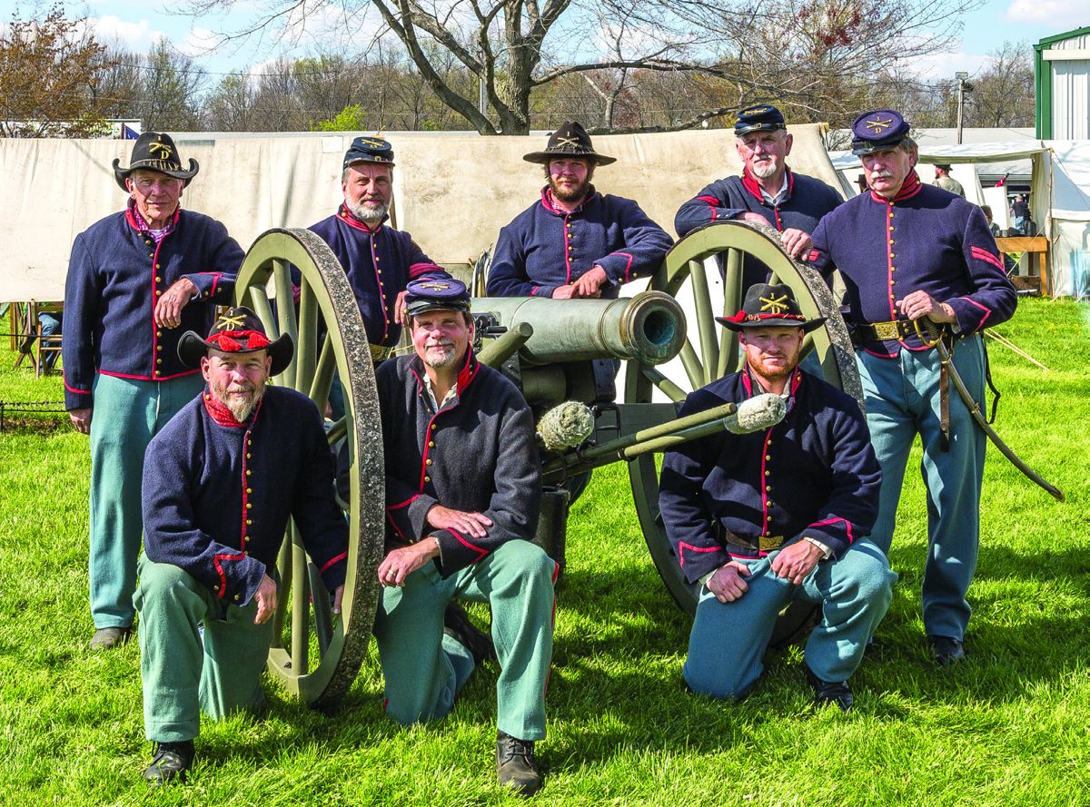 Group photo of Civil War artillery unit, the 1st Ohio Light Artillery, Battery “D” from left to right: Standing: Gerald Fry, Jerry Imperio, Joey Gotter, David Brockway and Greg Williams. Kneellng: David Gotter, Wayne Williams and Brandon Warner.