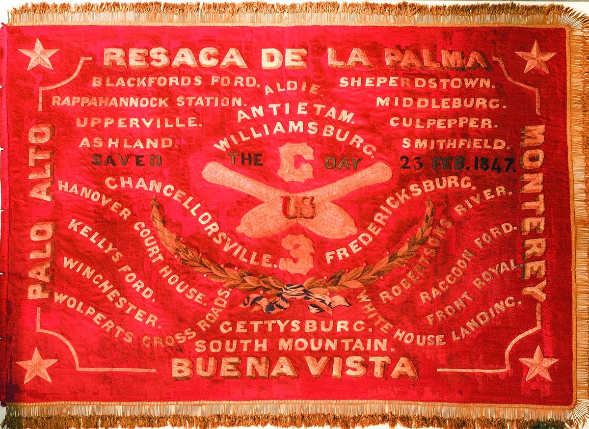 Flag of Battery C, 3rd Artillery Regiment with battle honors painted on it.