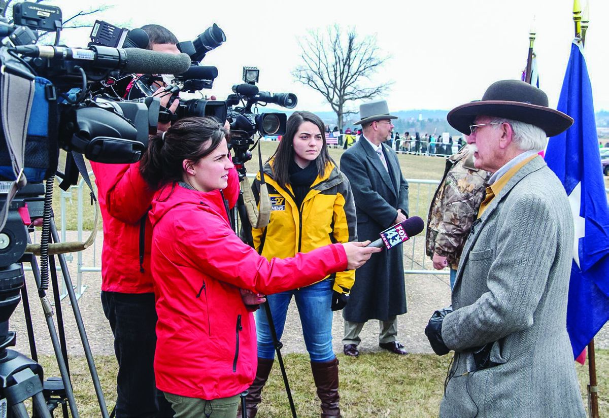 Sculptor Gary Casteel, who organized the event, was interviewed by