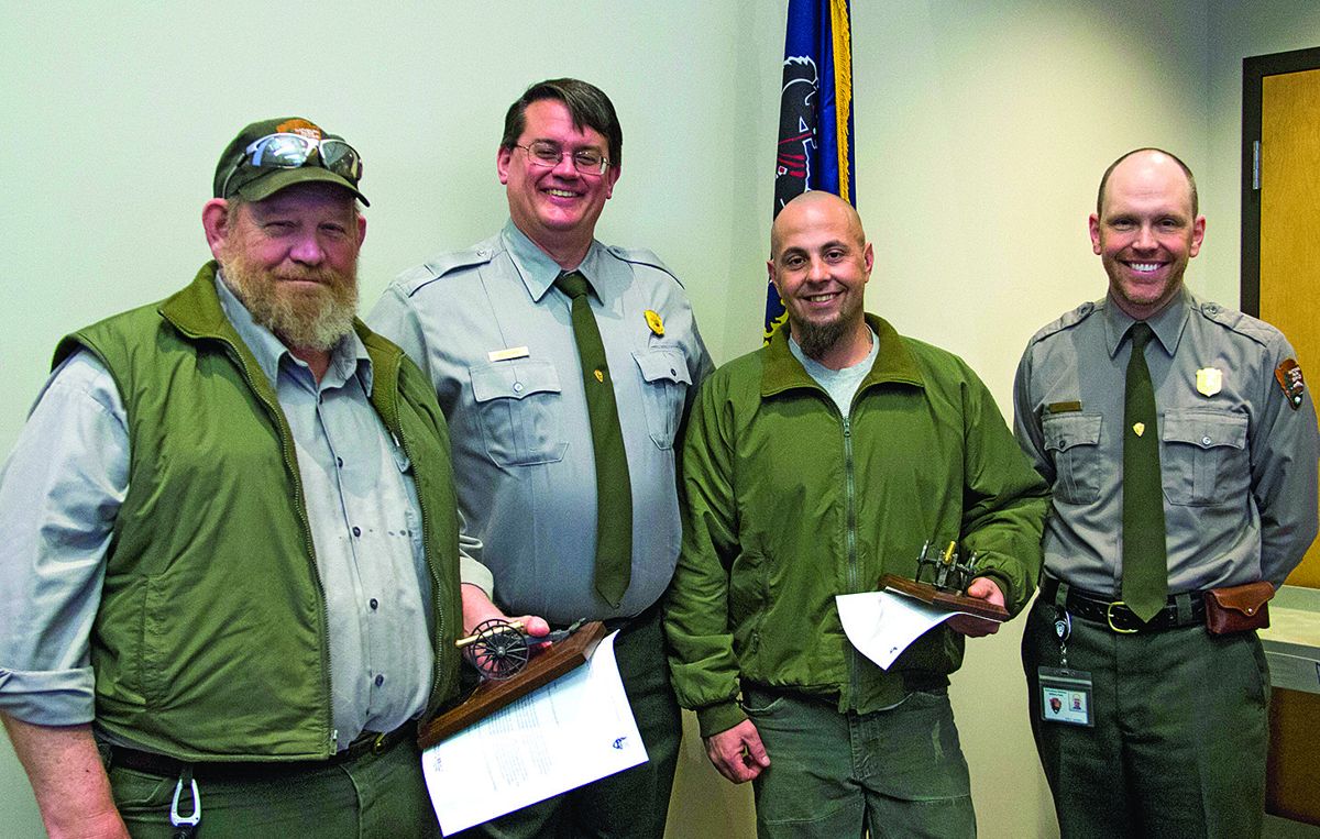 From left, Walter “Buzzy” Baker, award winner; Superintendent Ed Clark; Joshua Francisco, award winner; and incentive awards committee chair Greg Goodell.