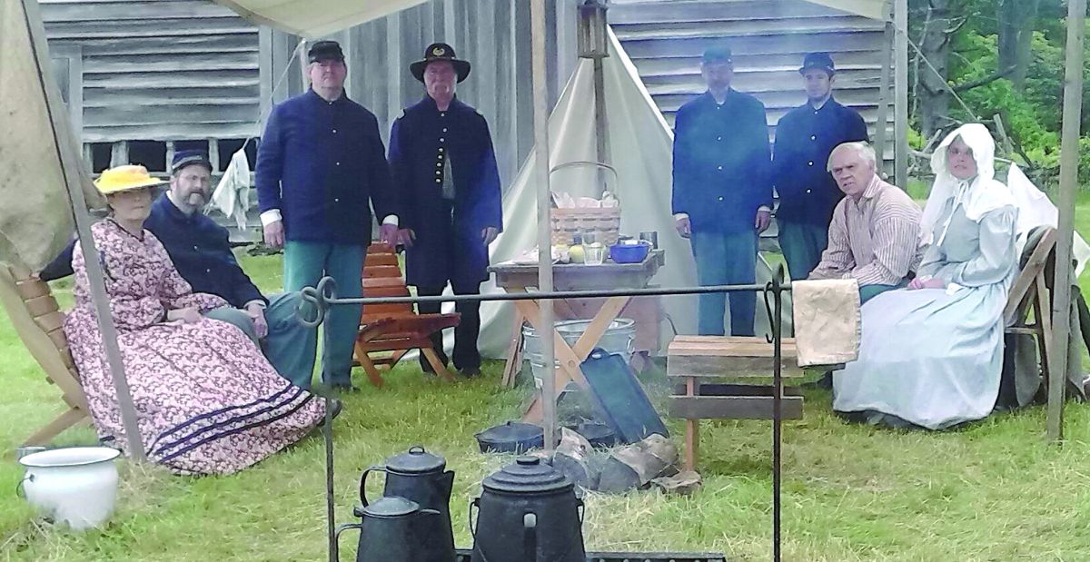 Members of the 142nd Pennsylvania Volunteer Infantry, Co. G, relaxing in their camp.