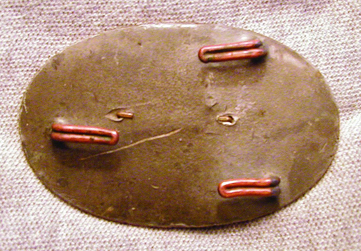Front and back of the pre-Civil War Georgia oval belt buckle.