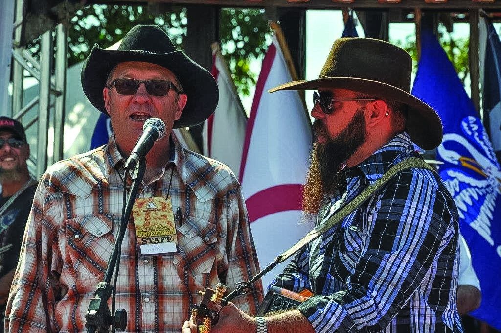 Tim Massey sings Proud Mary on stage with Johnny Voxx during the