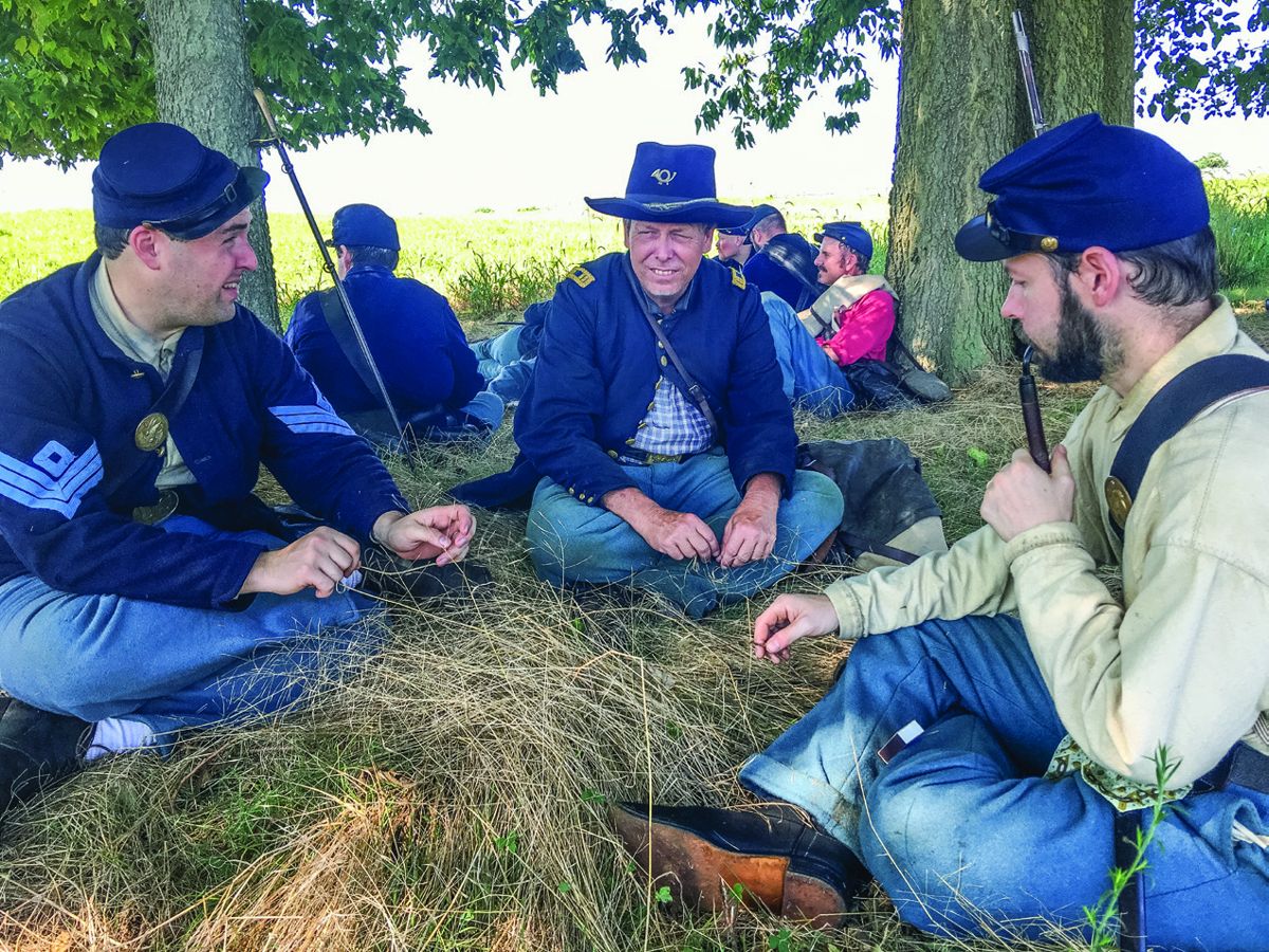Antietam March 2016 Marc Hermann, Jeffrey Hayes, and Craig Sneider plan the next part of the battlefield march. (Jeffrey Baldwin)