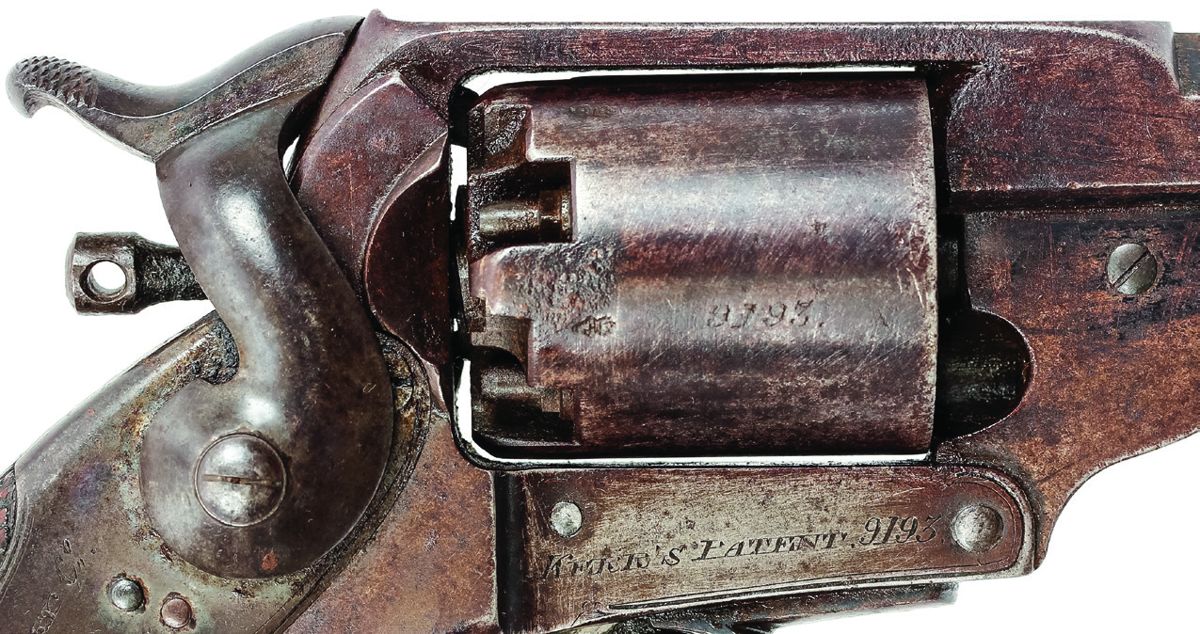 Close up of the right side of the revolver showing the KERR’S PATENT mark and matching serial numbers 9193 on the frame and cylinder.