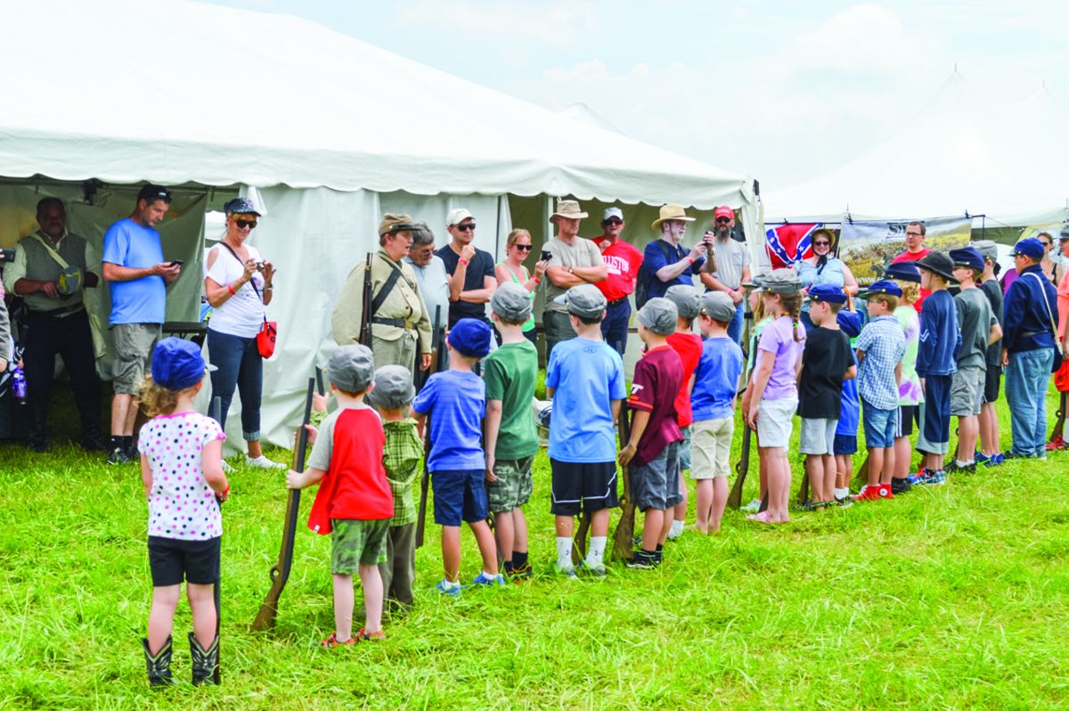New recruits are lined up for inspection outside the children’s activities tent at the reenactment.