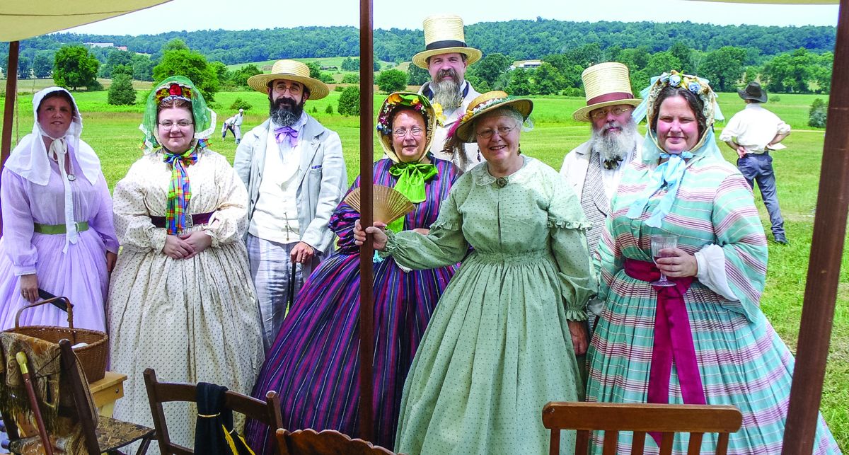 Sherri Groff, Sami Abate, Alex Groff, Brigitte Ross, Brian Ross, Faith Hintzen, Mark Hintzen, and Elaine Kessinger get in the spirit of the festival and wear clothing in the style of the 1860s.