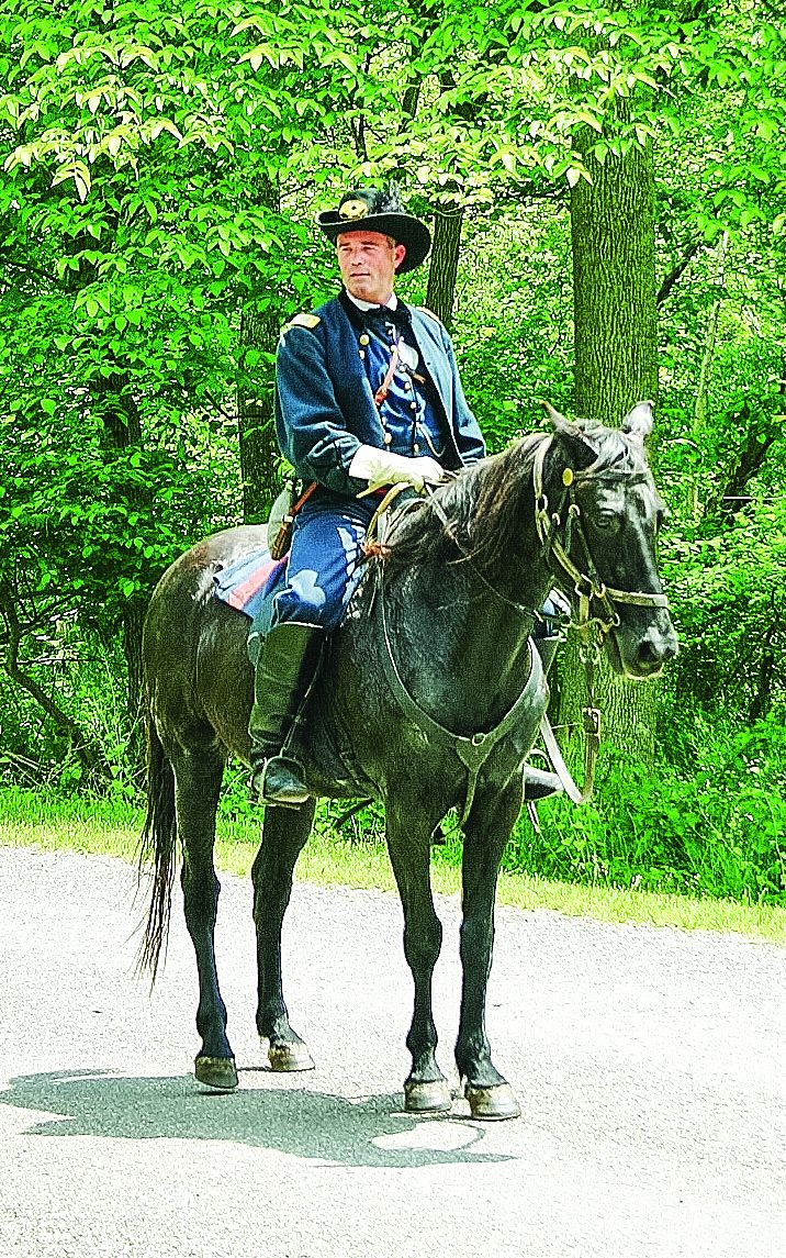 On horseback. Allaire Ken Aldous from Ossining, N.Y., shows the public what a mounted infantry officer looked like in the Civil War. (Chris Wantuck)