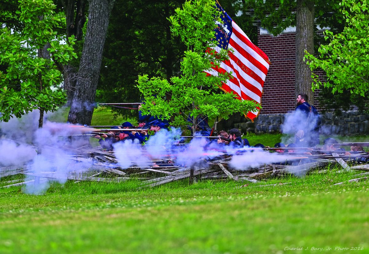 151st Pennsylvania firing at the barricade.