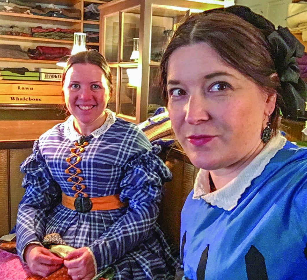Jessica Craig, of Torrington, Conn., and Anne Wolf, of Frederick, Md., enjoy a quiet moment at the Dry Goods Store.
