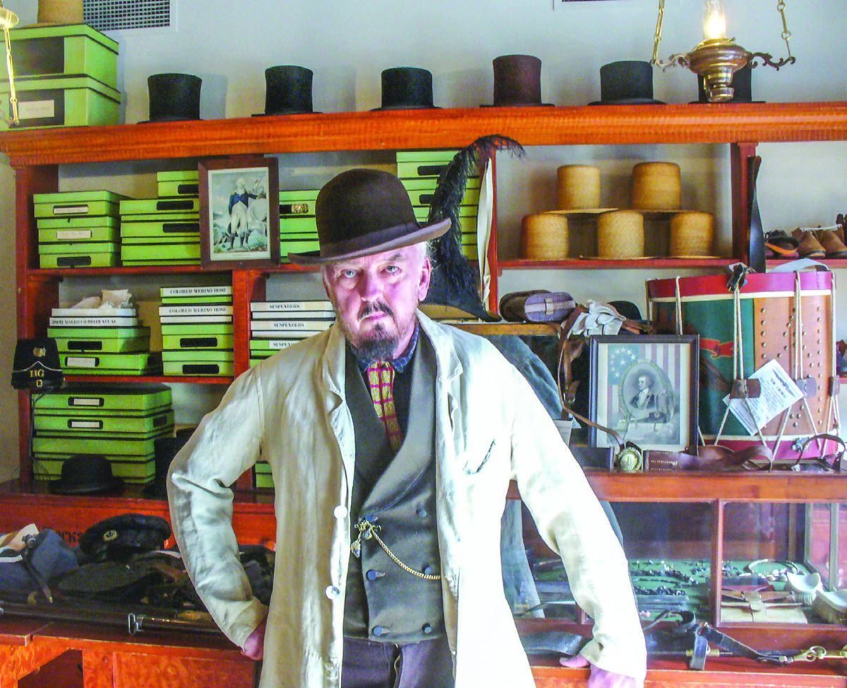 John King, Director of Living History at Harpers Ferry NHP, of Harpers Ferry, W.V., helps interpret Frankel’s Clothing Shop. Many of the items on display were purchased by Mr. King.