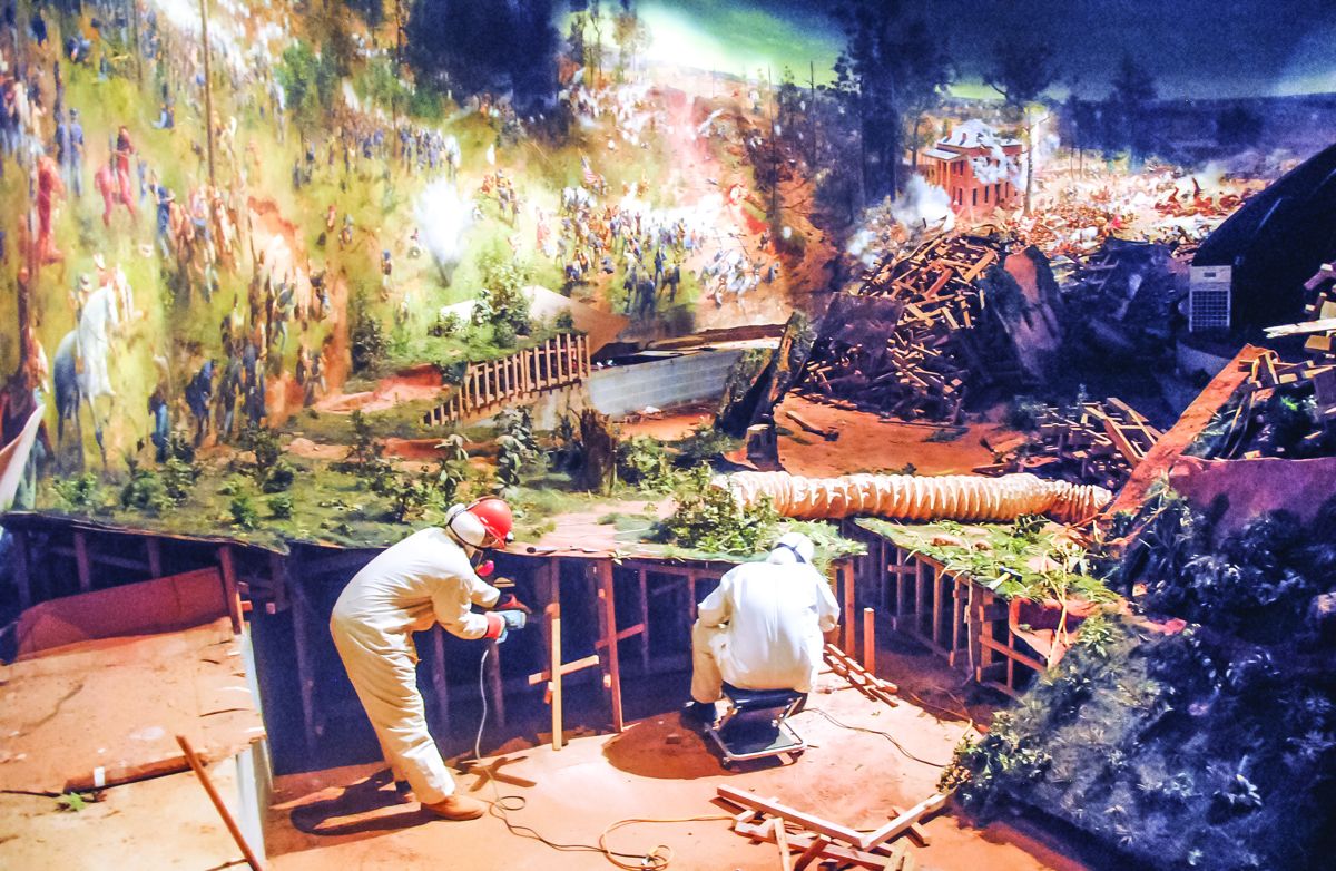 Fall 2015: 128 plaster figures and the fiberglass diorama base are removed so conservators can access all parts of the painting. The figures will be restored.