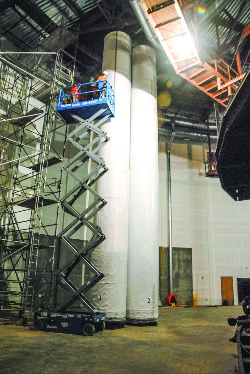 A few hours later, Scroll 2 is lowered into place and secured to the top mounting rail. The move took two days.