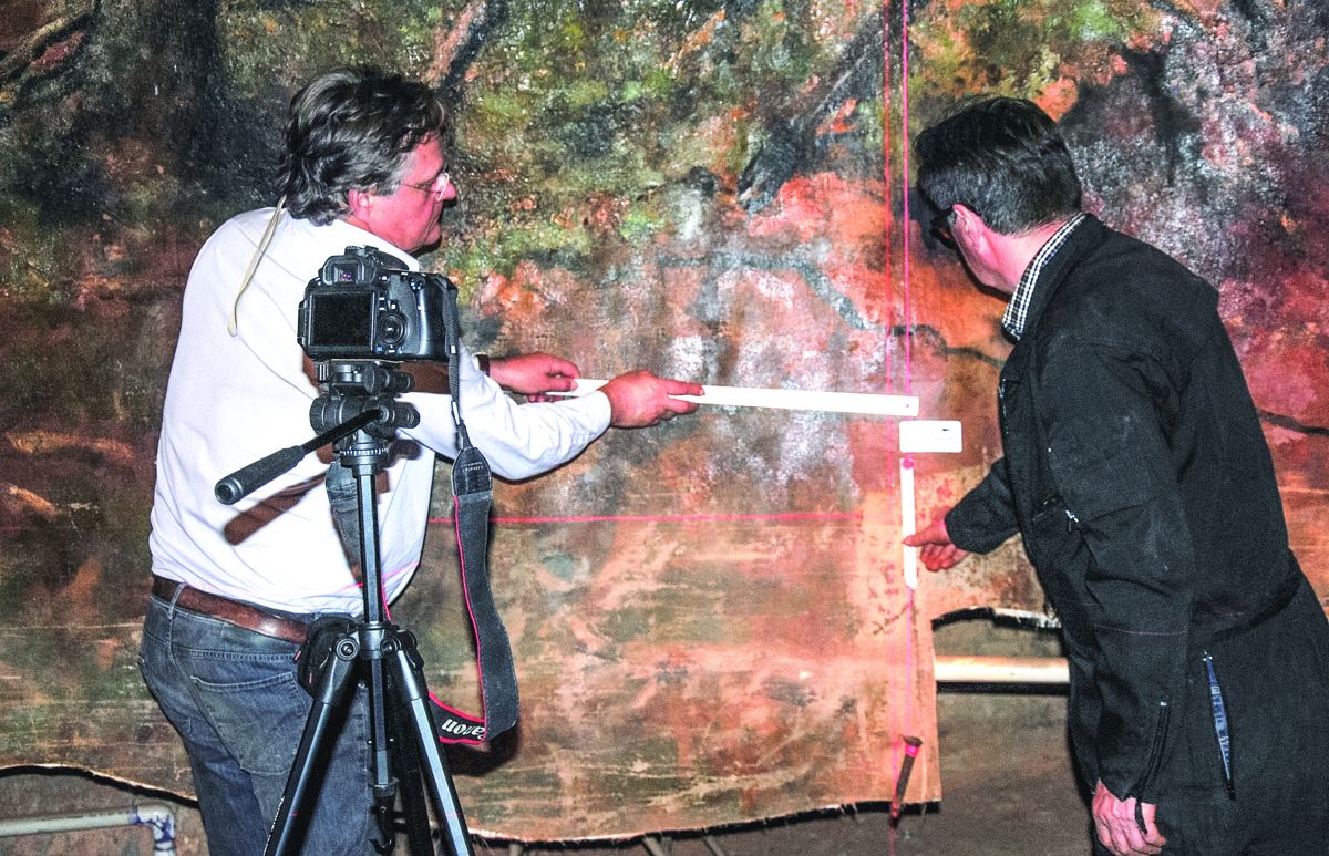 Spring 2016: Conservators Thomas Schoeller (left) and Christian Marty (right) begin mapping, measuring, and examining the painting.