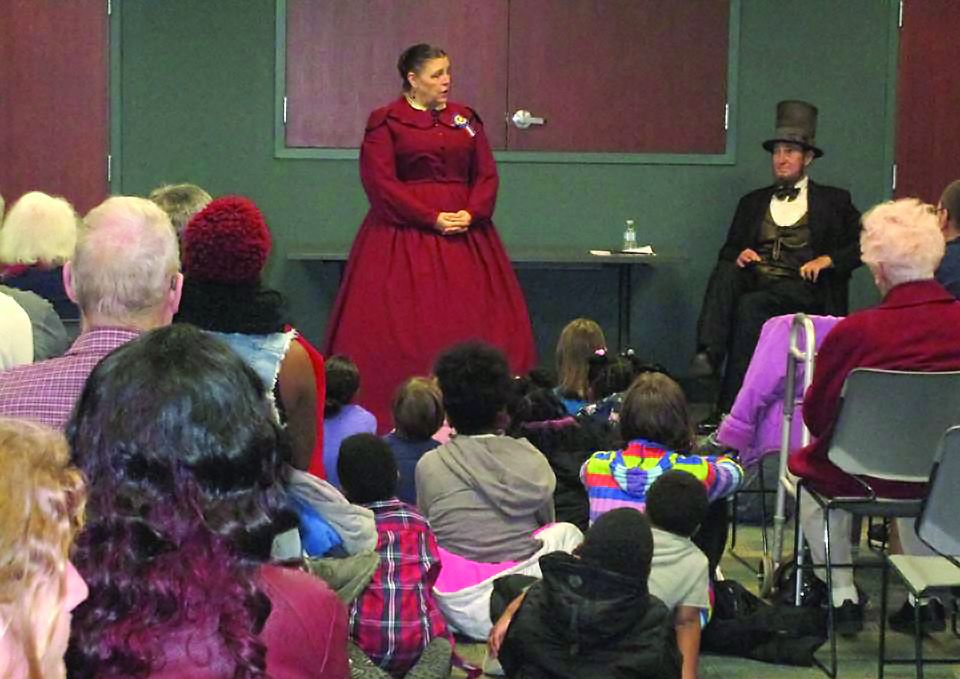 Donna and Max Daniels telling Lincoln stories to people of all ages.