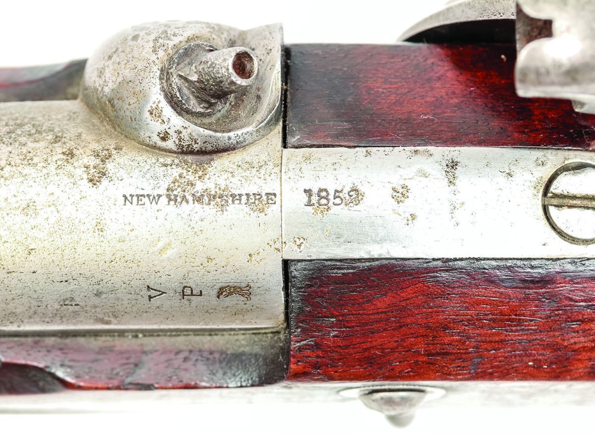 Close up of the breech area of Whitney Variant M-1842 #U75, showing the original U.S. arsenal proof marks and date on the breech plug tang, as well as the mark NEW HAMPSHIRE on the top of the barrel breech.