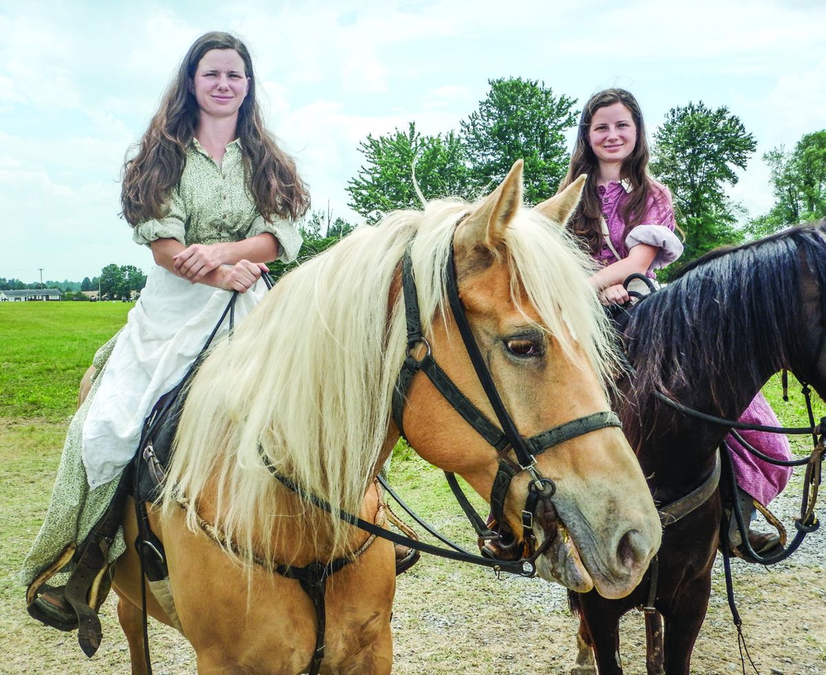 Bethany Reckner, left. She is representing heroine Mollie Morehead. Her horse is Estia. Kimberly Reckner is right. Horse is Dolce. Both are from Sebree, Ky.