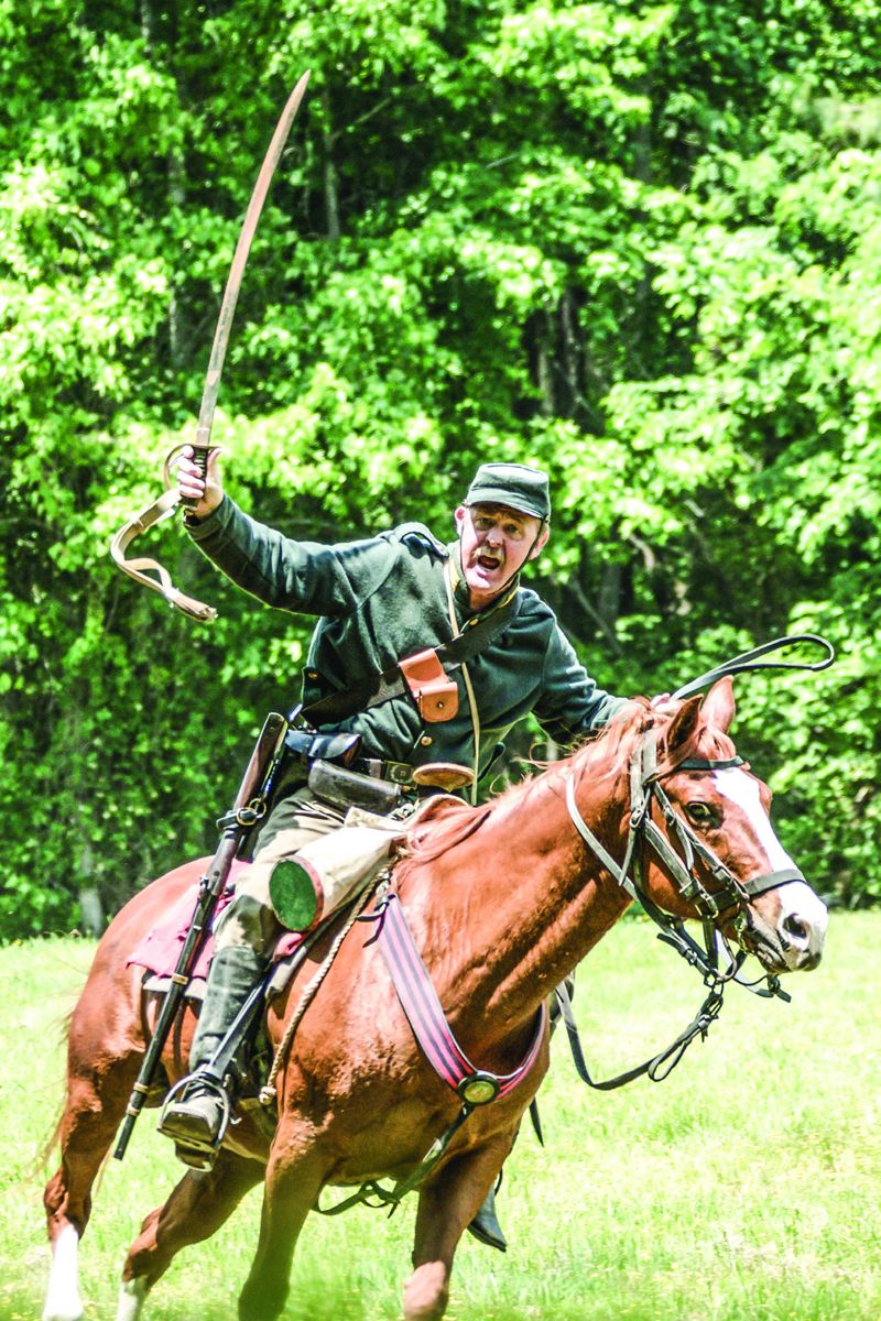 Tom Truitt veers away from the Union defenders.