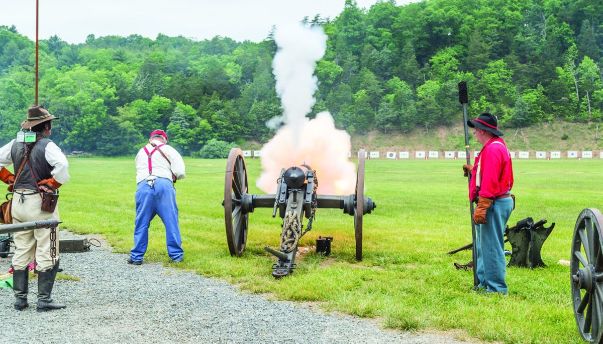 Ned Harris of the 1st Regiment Virginia Volunteers touches off Rob West’s reproduction 1861 3-inch Tredegar Rifle—the first rifled cannon made at the Tredegar Iron Works.
