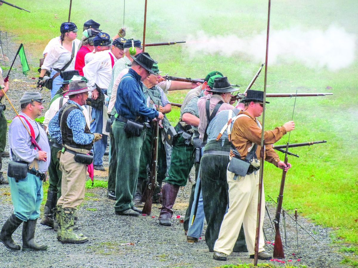 In spite of rain from tropical storm Nate, musket company matches proceeded as scheduled, and a fun, if damp, time