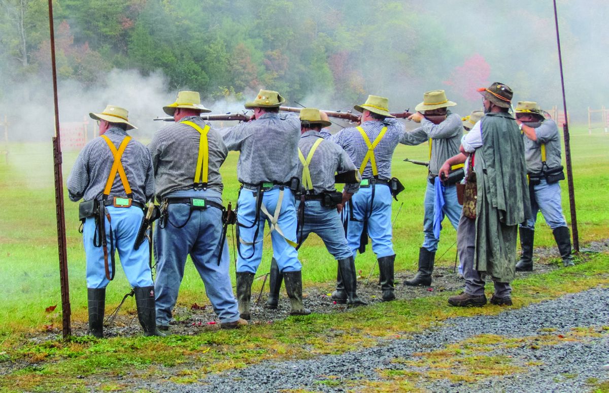 5th Virginia Volunteer Cavalry fires a volley at the clay pigeons on a cardboard backer during the musket company match.