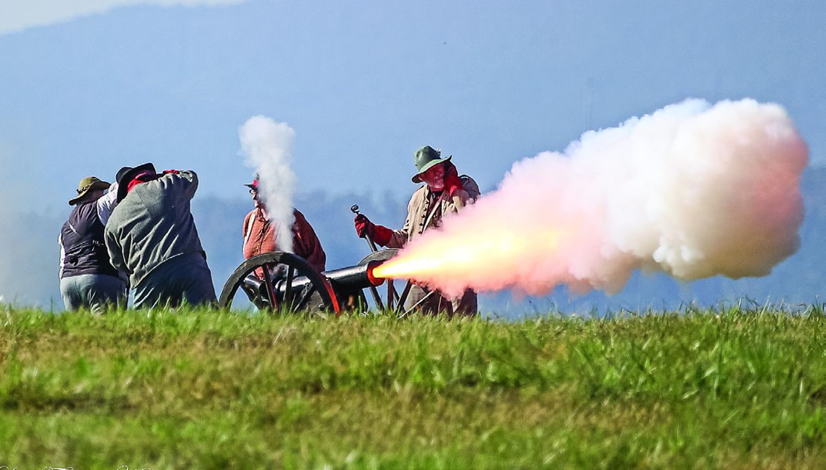 Peninsula Artillery manned by Kathy Morrissey Hare, Kathleen Faulkner, and Mark Janser.