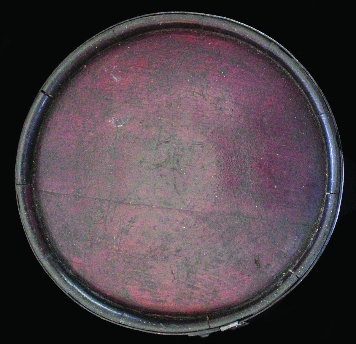 The reverse side of the same canteen with a faint “TR” at top