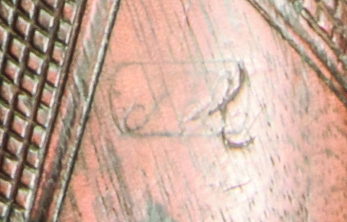 Weak example of the JT sub-inspection cartouche found on the reverse grip of most U.S. martial Mass. Arms Adams revolvers.