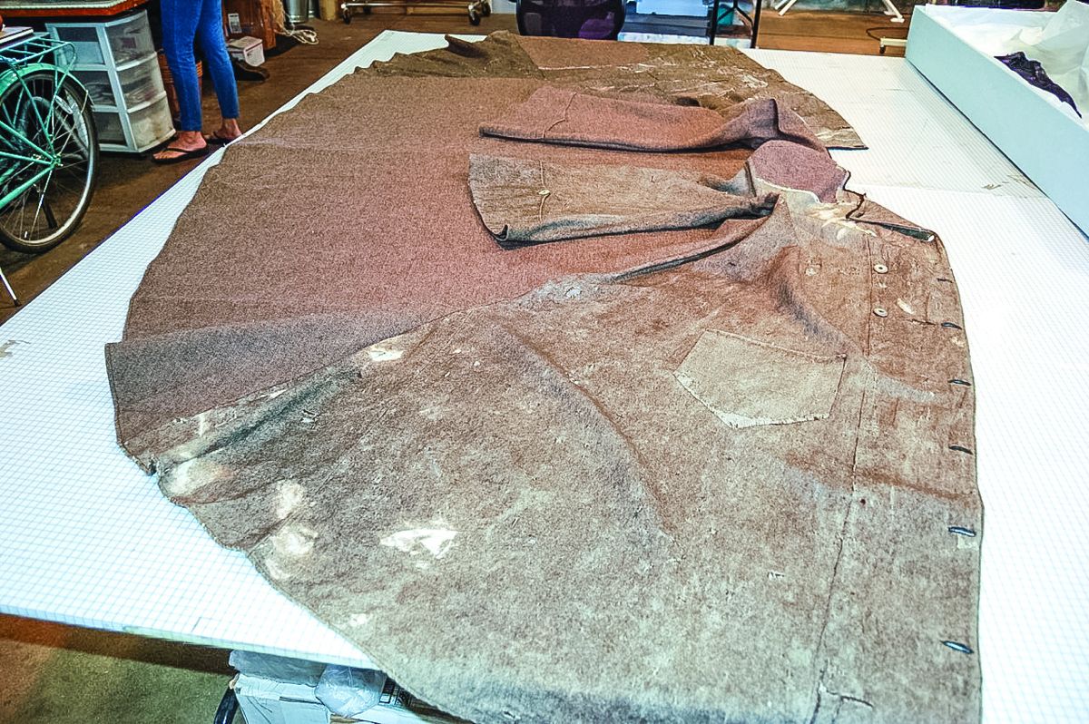 The coat, upon receipt and before 2017 restoration.