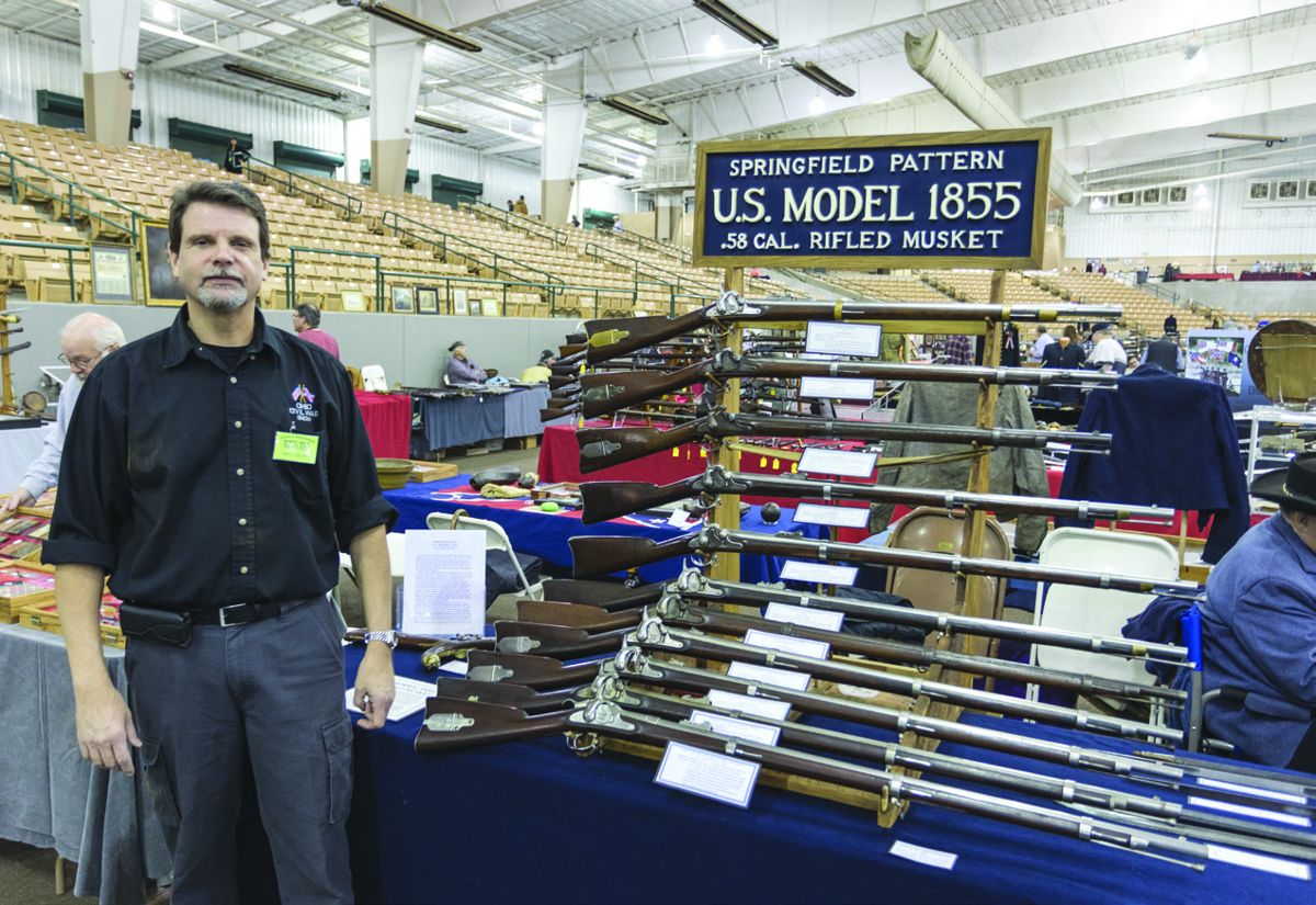 Wayne Williams, Promoter of the Ohio Civil War Show, with his collection of U.S. Model 1855 muskets. (All photos Jack Melton)
