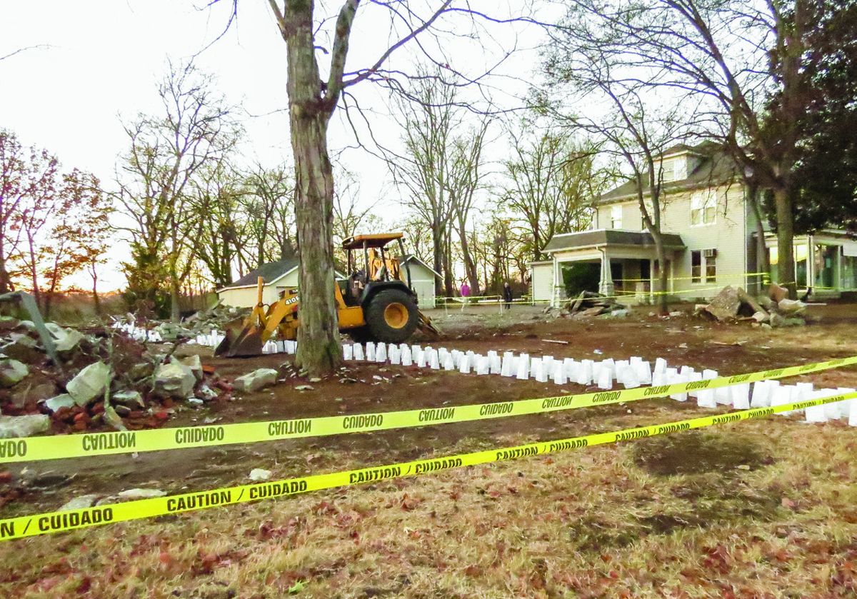 Part of the recovery of the battlefield in process. A small structure was removed. Candle bags mark federal trench lines near the Carther House. The large tan frame building will be moved in the next few weeks. (All photos Greg Wade)