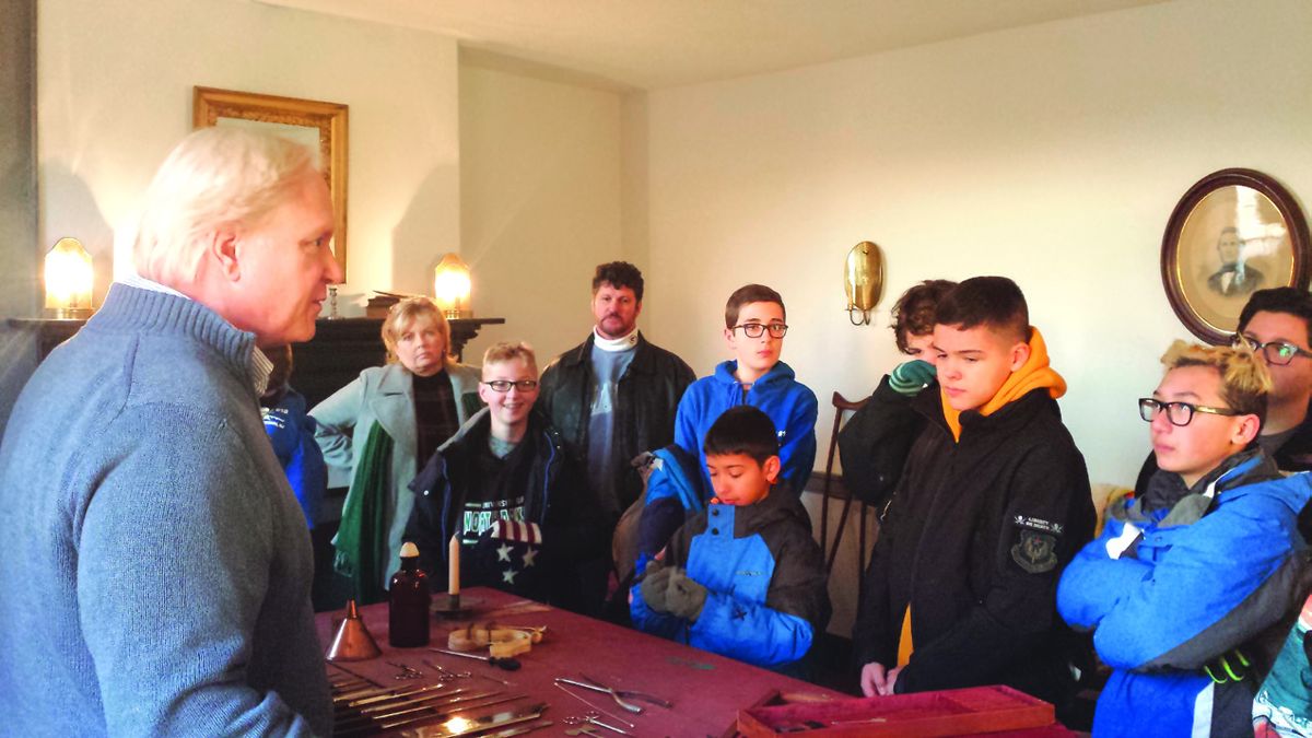 A New Jersey Boy Scout troop learns from GBPA Vice-President for Operations Kirk Davis about the Confederate field hospital for wounded officers that was in the front parlor of the house on the Historic Daniel Lady Farm in July 1863.
